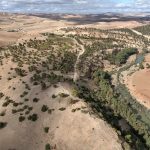 Fotografia aerea da drone del sito di Oued Beht (foto: A. Garcia-Molsosa e T. Wilkinson, Archivio OBAP) / Aerial photograph of Oued Beht taken by drone (photo: A. Garcia-Molsosa and T. Wilkinson, OBAP Archive)